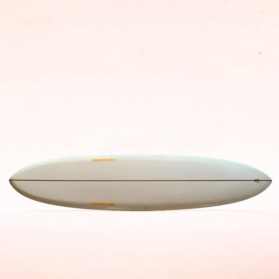 Ryan Lovelace Lovemachine Thick Lizzy mini-glider surfboard, full deck view, showing refined outline and tri-plane bottom.